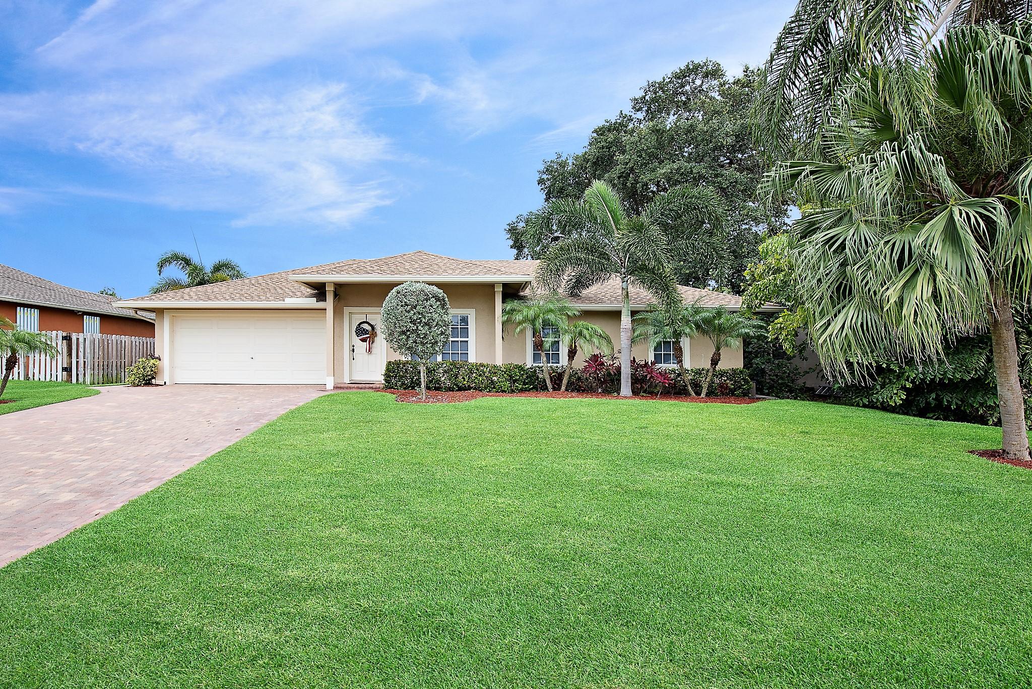 6597 Riparian Road Lake Worth, FL 33462 - Photo 1 of 16 Front of Home