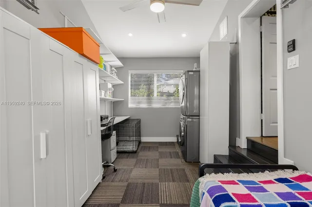 a bedroom with windows