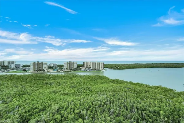 a view of a lake with a big yard