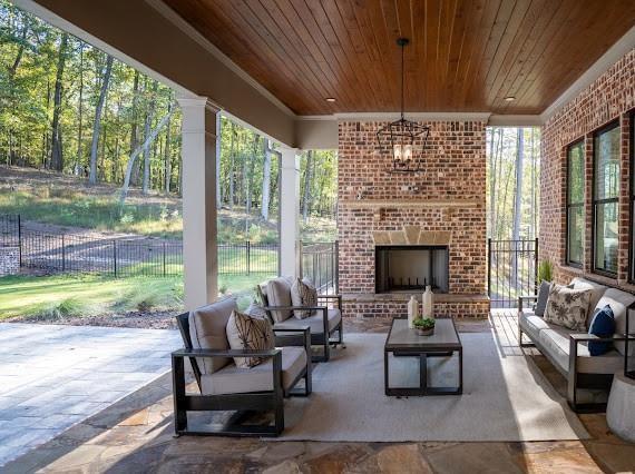 201 Westminster Drive Athens, GA 30607 - Photo 68 of 85 a living room with furniture and a fireplace