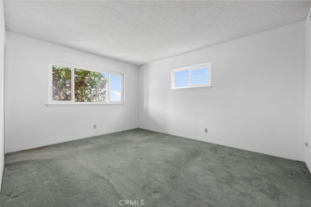 11675 Calvin Street Yucaipa, CA 92399 - Photo 16 of 30 an empty room with a window