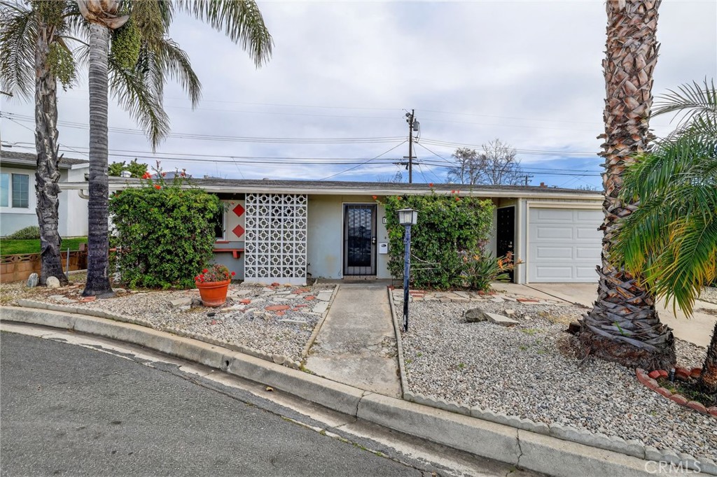 11675 Calvin Street Yucaipa, CA 92399 - Photo 2 of 30 front view of house with a yard and palm trees