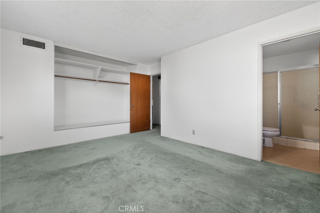 11675 Calvin Street Yucaipa, CA 92399 - Photo 26 of 30 an empty room with closet