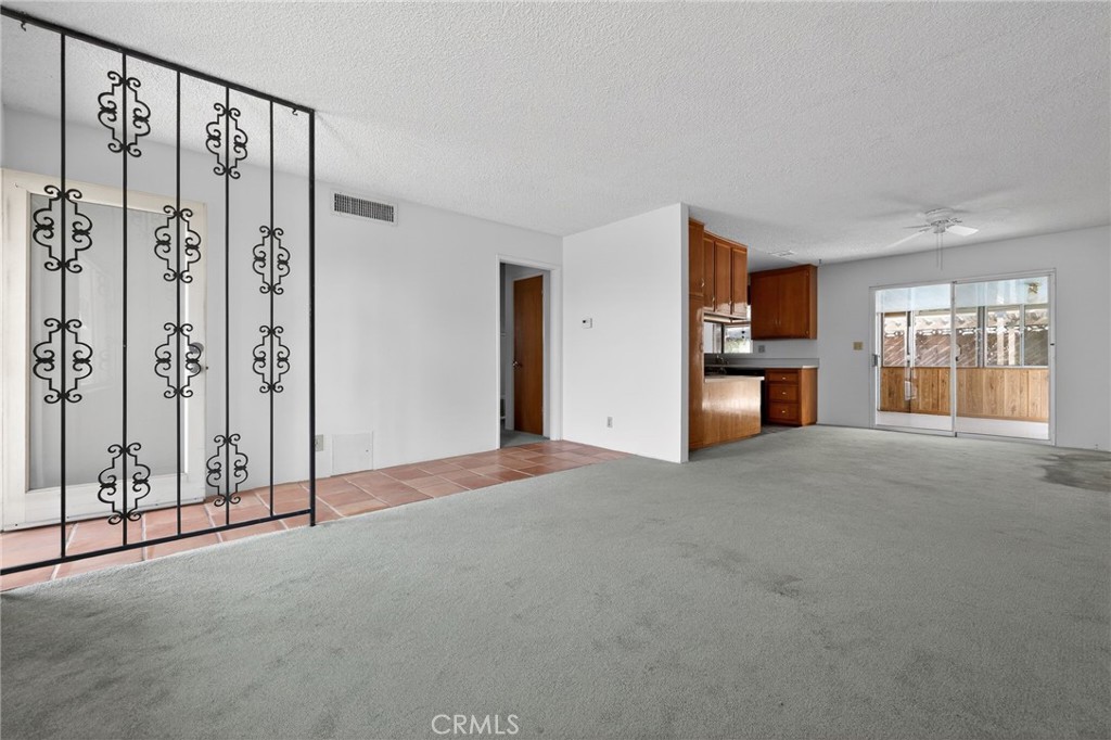 11675 Calvin Street Yucaipa, CA 92399 - Photo 10 of 30 a view of an empty room with a window