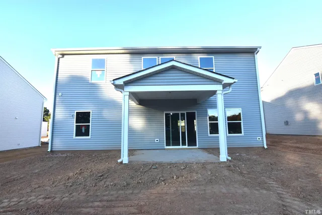 a picture of a bench in a white building