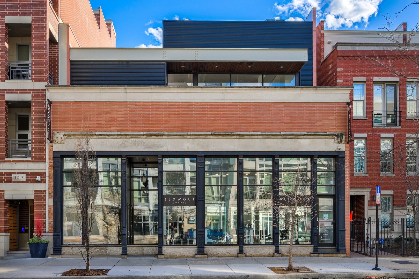 a front view of building with street