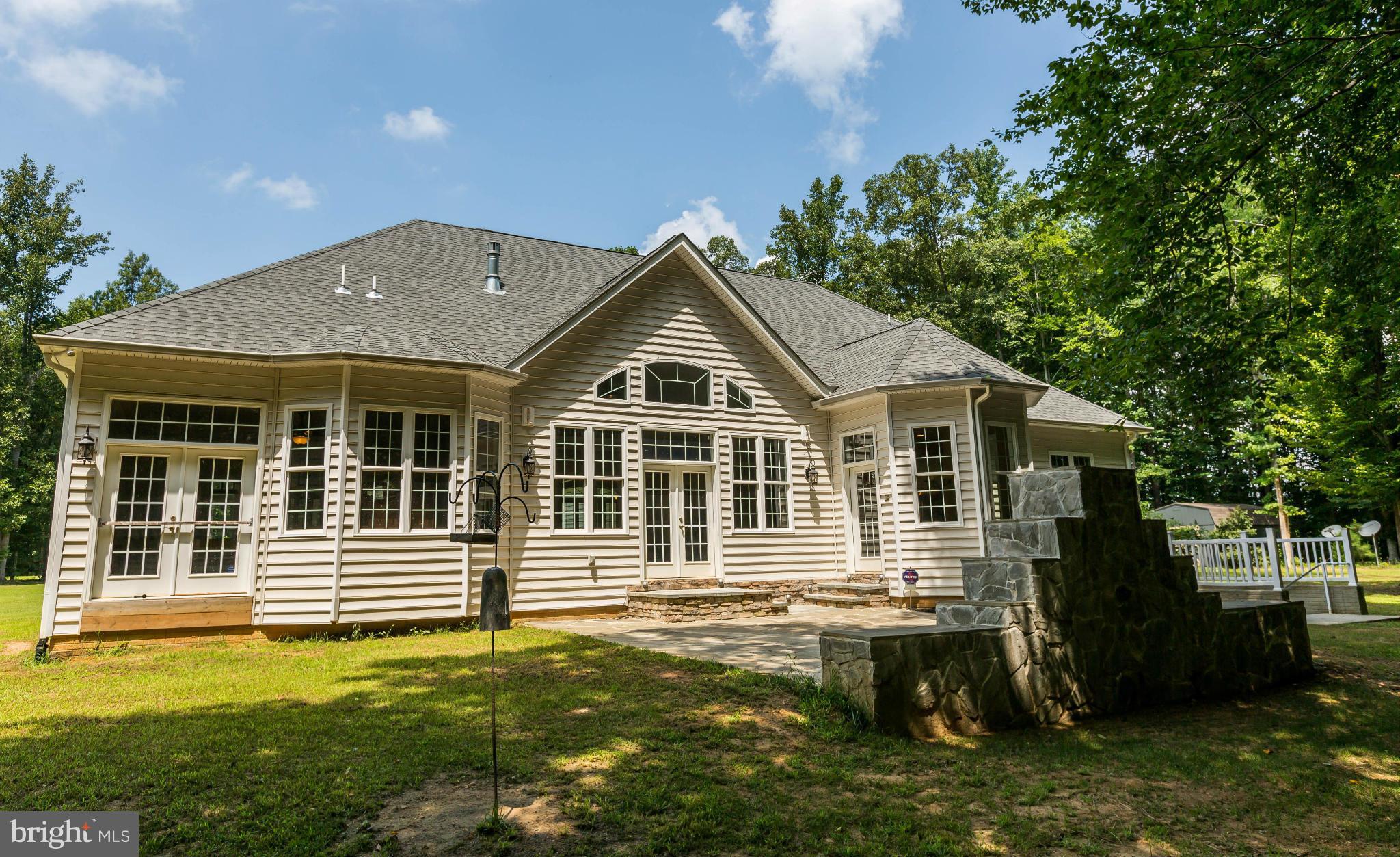 19385 Country Road Beaverdam, VA 23015 - Photo 26 of 30 a front view of a house with a yard
