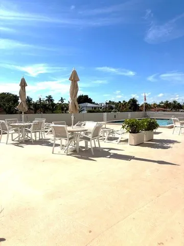 a view of a swimming pool with an ocean view