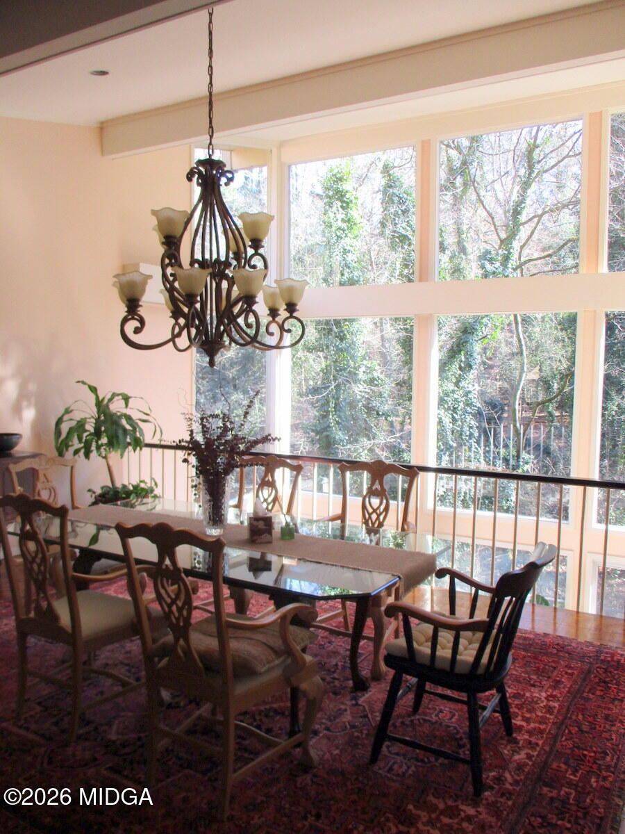 1121 South Jackson Springs Road Macon, GA 31211 - Photo 7 of 29 a view of a dining room with furniture window and outside view