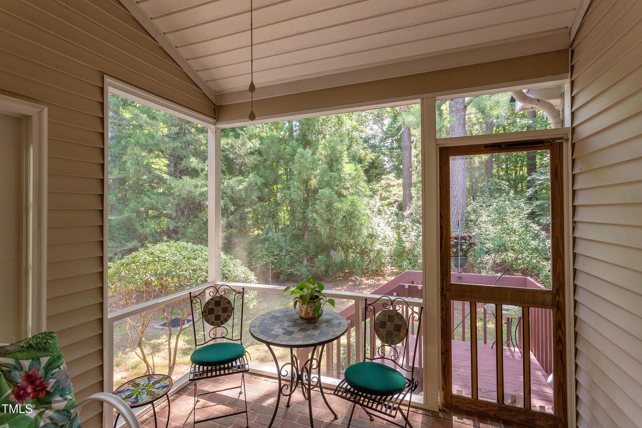 309 Baneberry Close Pittsboro, NC 27312 - Photo 33 of 43 a room with furniture and garden view