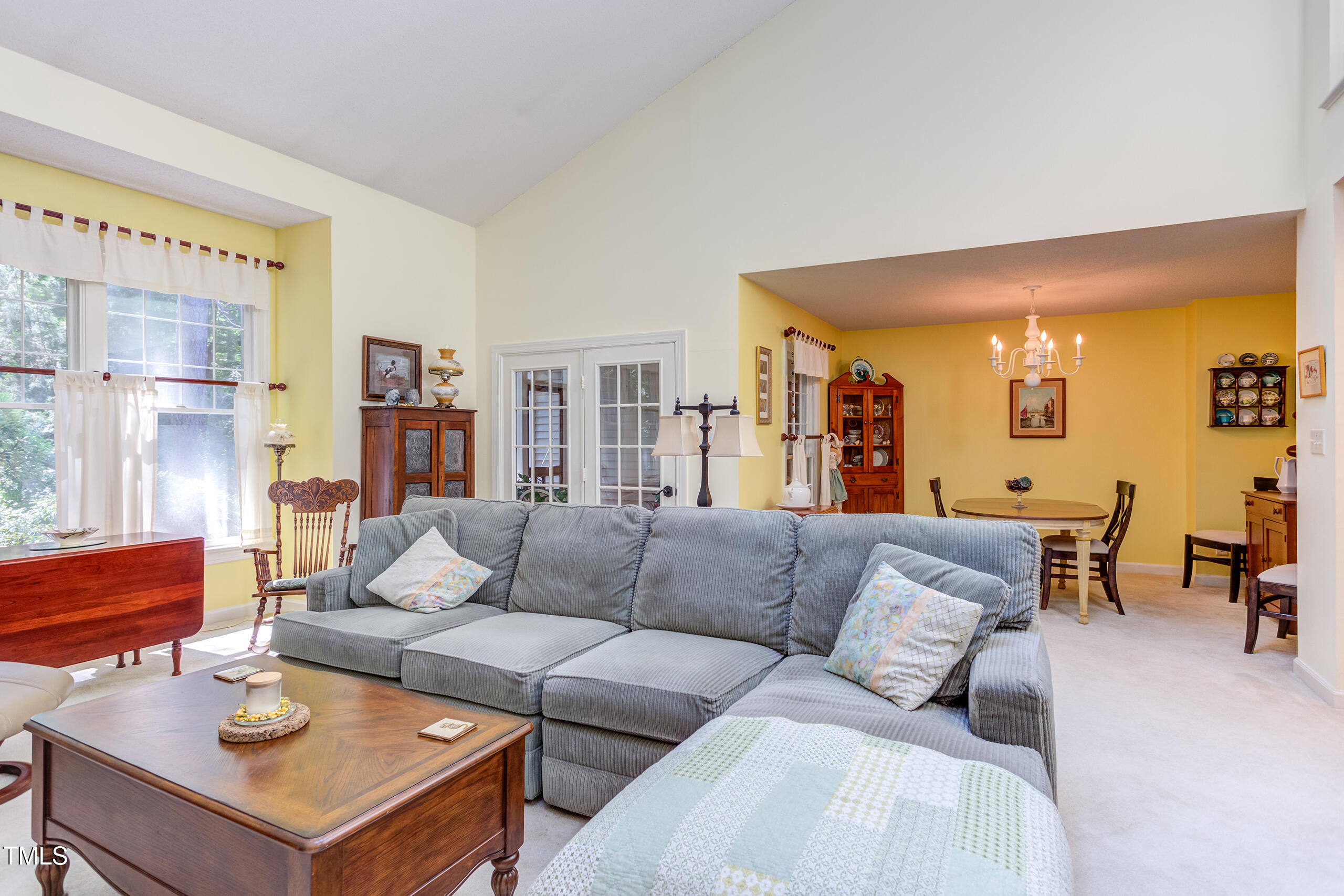 309 Baneberry Close Pittsboro, NC 27312 - Photo 8 of 43 a living room with furniture and a large window