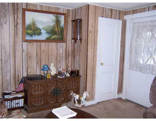 9 Thornton Road Bangor, ME 04401 - Photo 7 of 16 Living Room. Front door and coat closet
