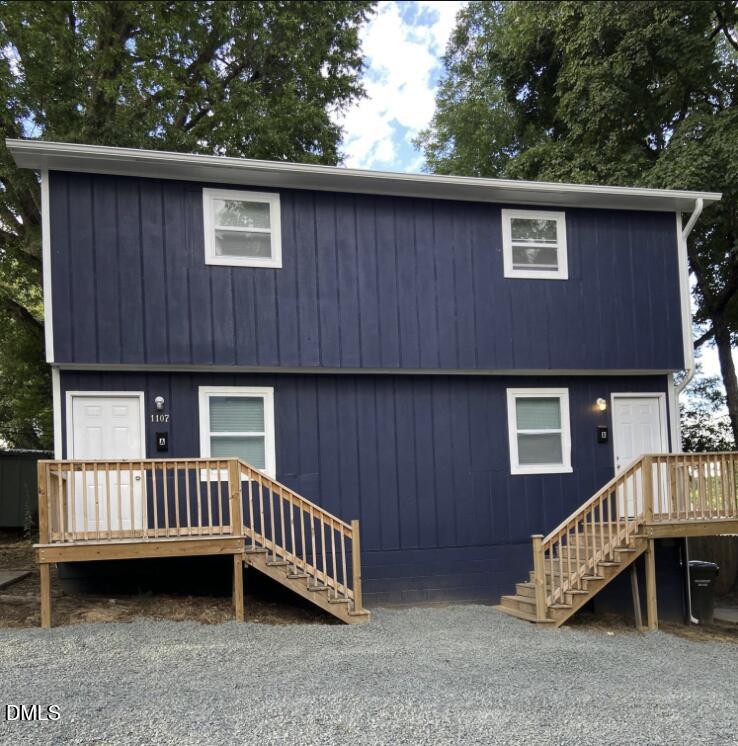 a backyard of a house with a deck