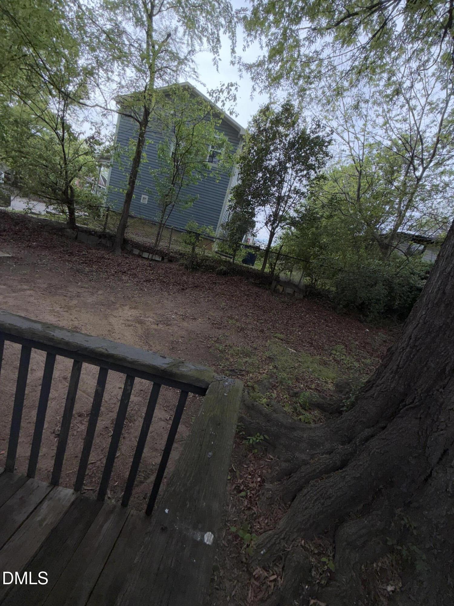 1107 Worth Street Durham, NC 27701 - Photo 17 of 17 a view of backyard with green space