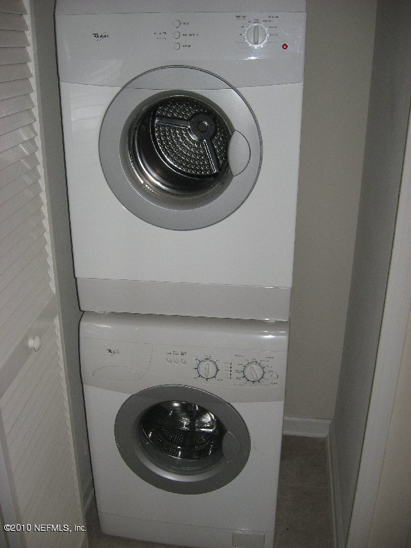 7920 Merrill Road, Unit 602 Jacksonville, FL 32277 - Photo 11 of 12 a close up view of washer and dryer