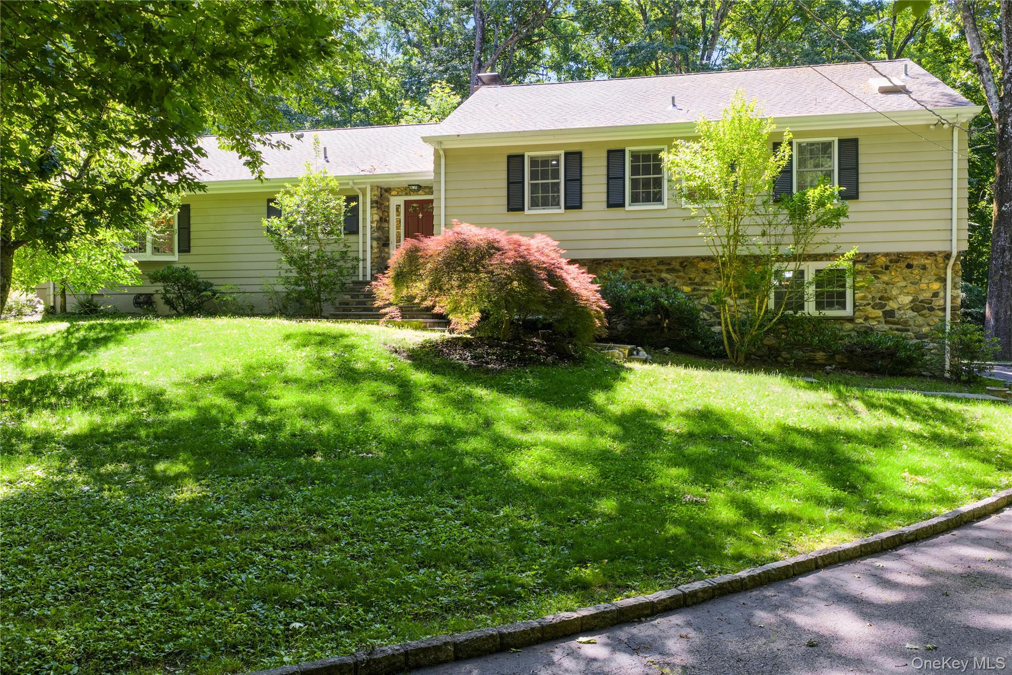 105 Cross Ridge Road Chappaqua, NY 10514 - Photo 1 of 43 Welcome to 105 Cross Ridge Rd, walkable to Chappaqua train and village center, this renovated split ranch style home with expansive rear slate patios offers both privacy and a neighborhood setting. This 4 bedroom, 2 full bath and 2 powder room home offers 2 finished levels and is move-in ready.