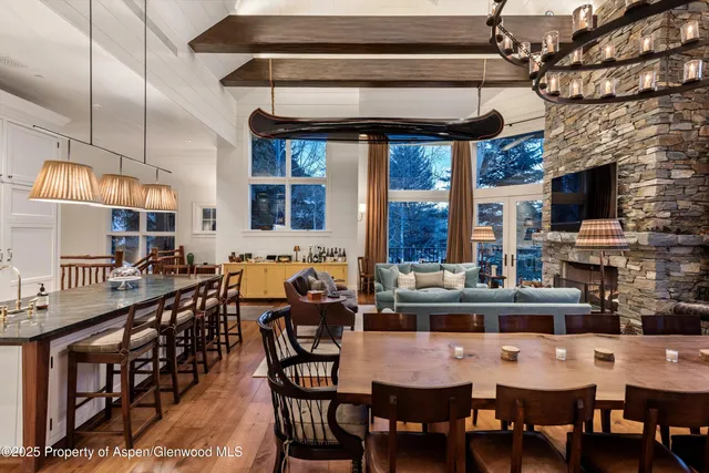a bedroom with a bed window and wall painting