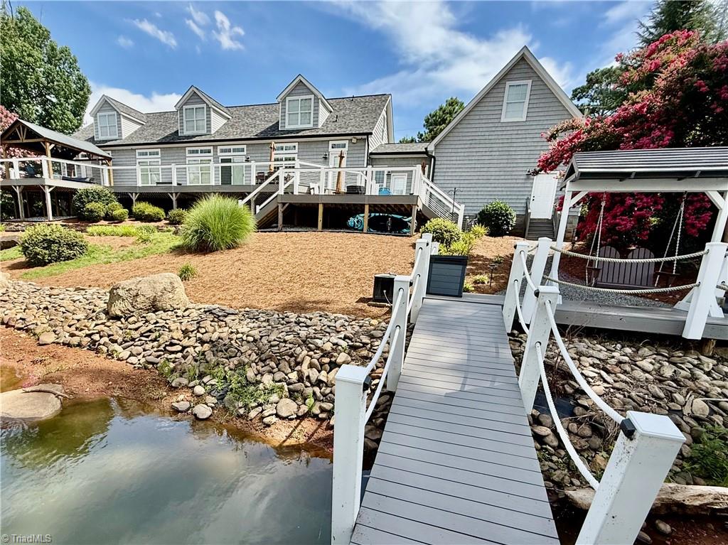1742 Riverview Road Lexington, NC 27292 - Photo 1 of 49 Enjoy coming home after playing on the lake and docking on your own private pier. The cove protects the water from a lot of big waves made by boats. This makes docking easier.