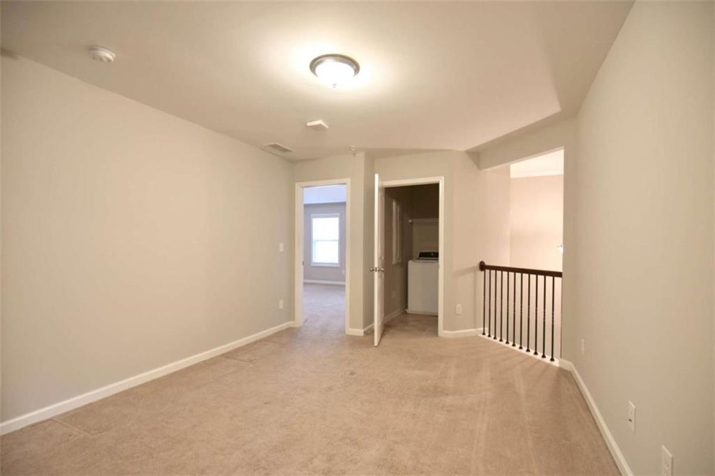 1223 Foxcroft Lane Cumming, GA 30041 - Photo 15 of 33 an empty room with windows