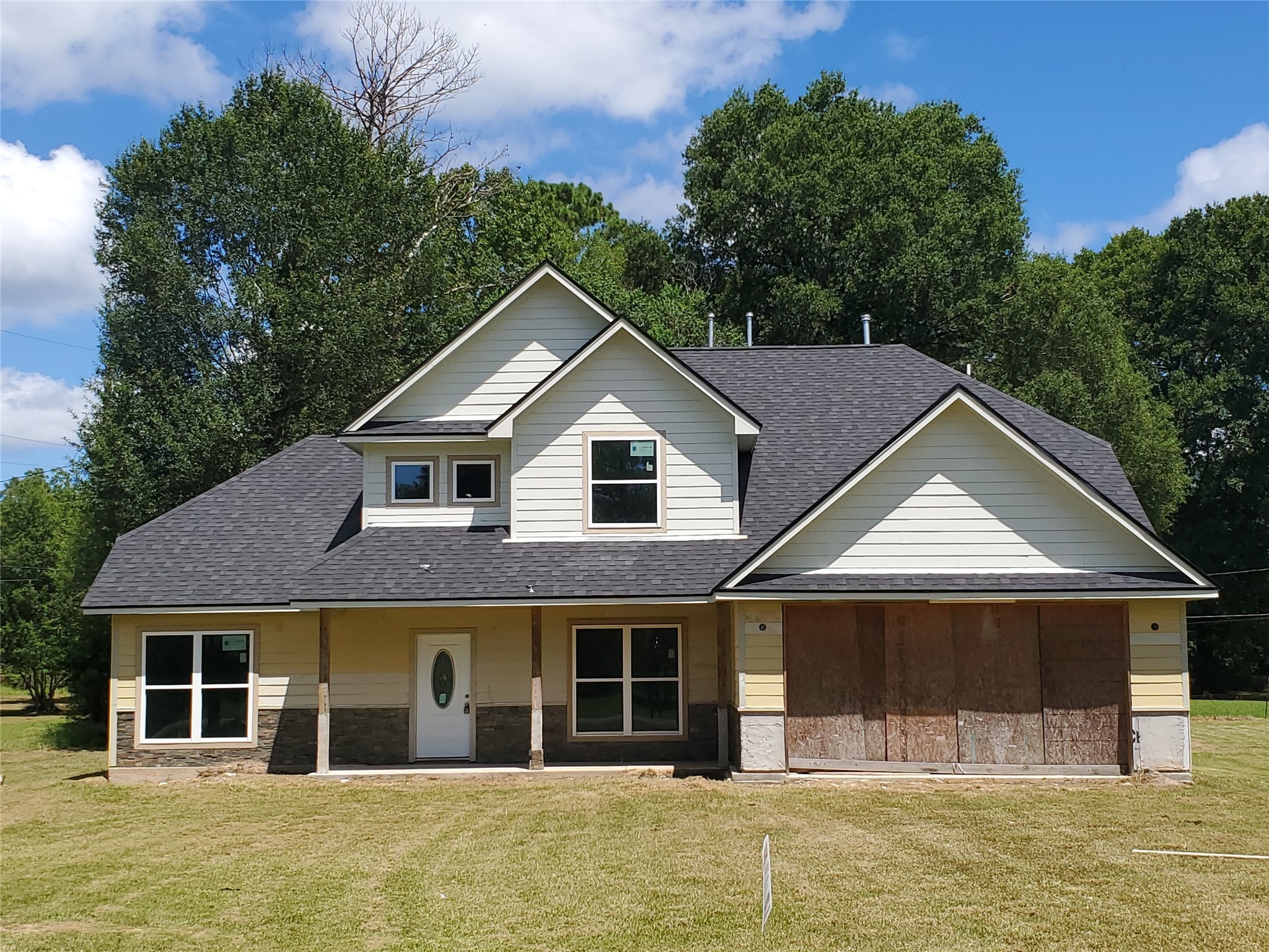 a house view with a garden space