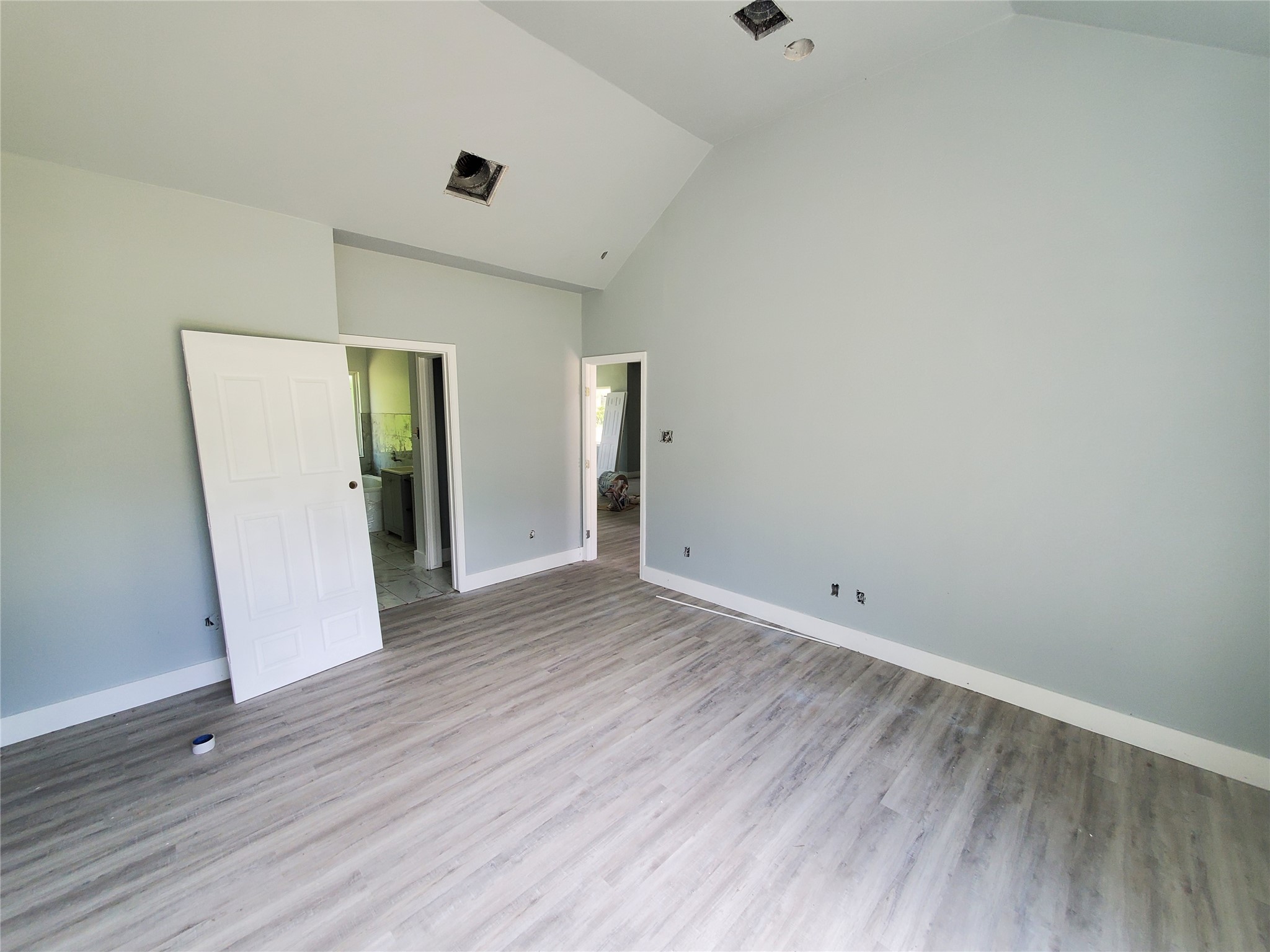 6985 Ellen Lane Beaumont, TX 77708 - Photo 14 of 34 a view of an empty room with wooden floor and a window