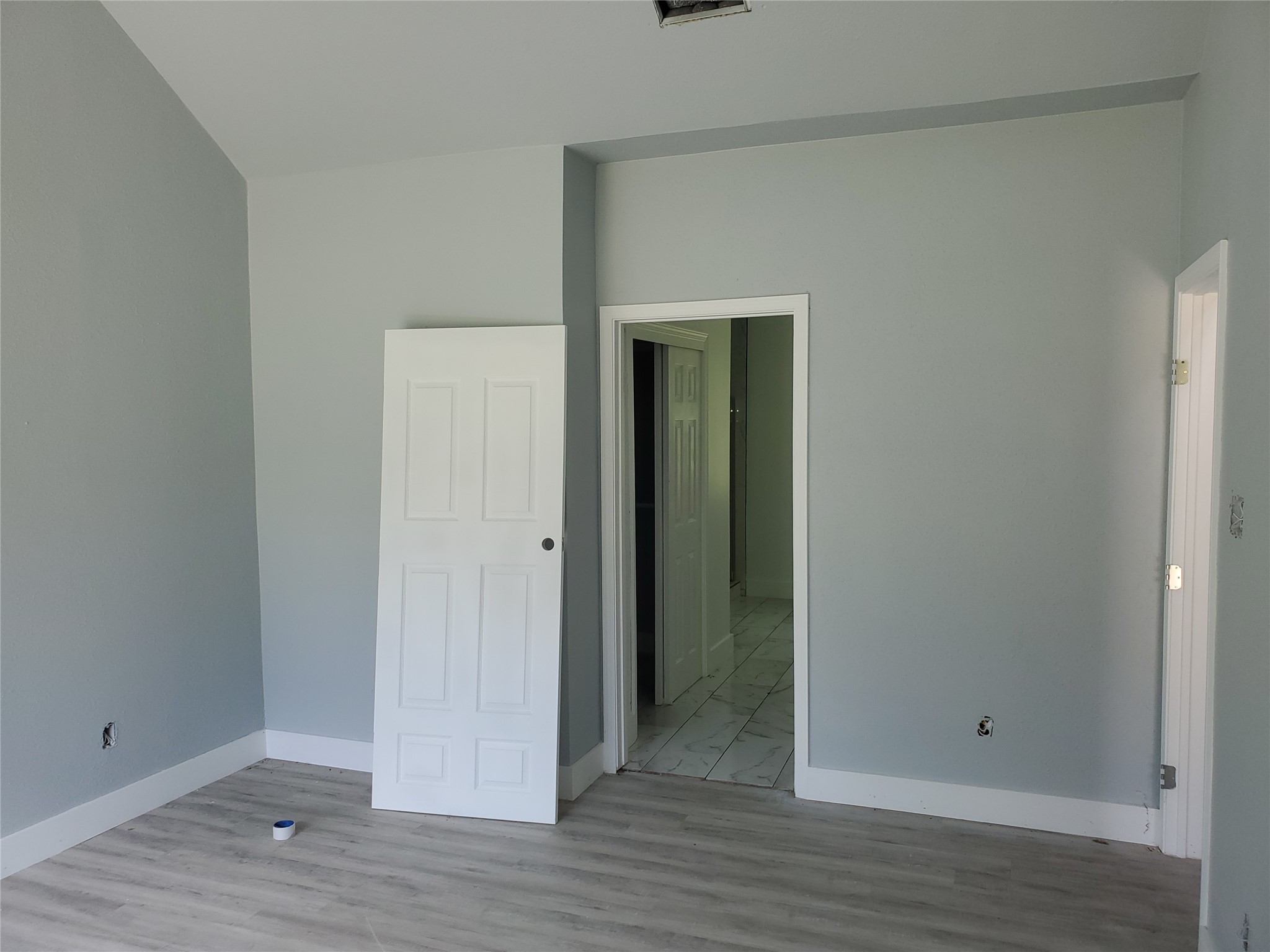 6985 Ellen Lane Beaumont, TX 77708 - Photo 15 of 34 a view of an empty room with wooden floor