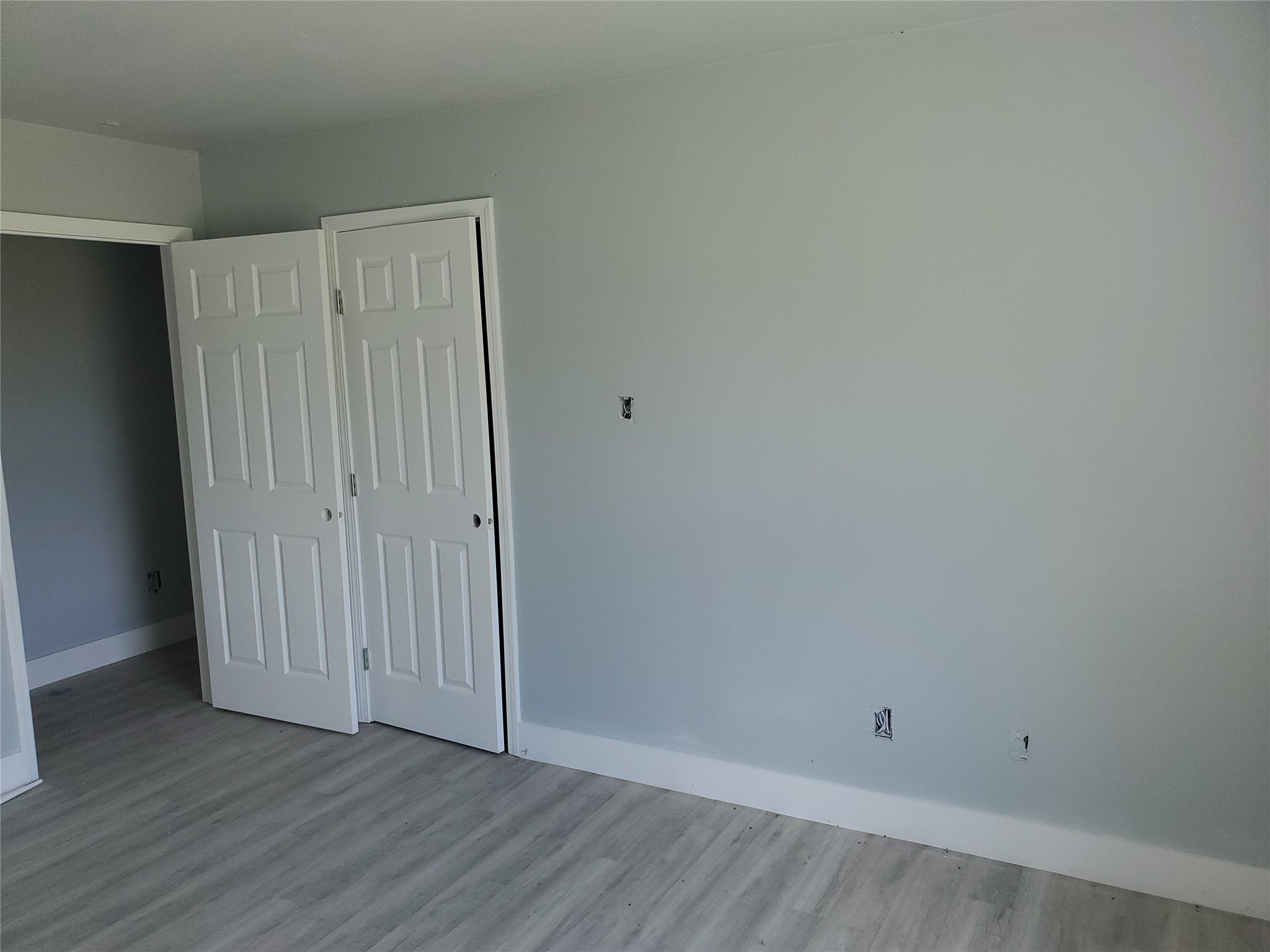 6985 Ellen Lane Beaumont, TX 77708 - Photo 23 of 34 a view of an empty room with wooden floor