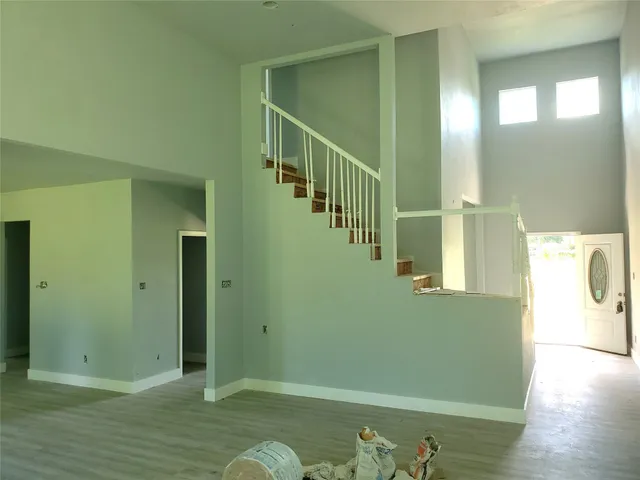 a view of entryway with wooden floor