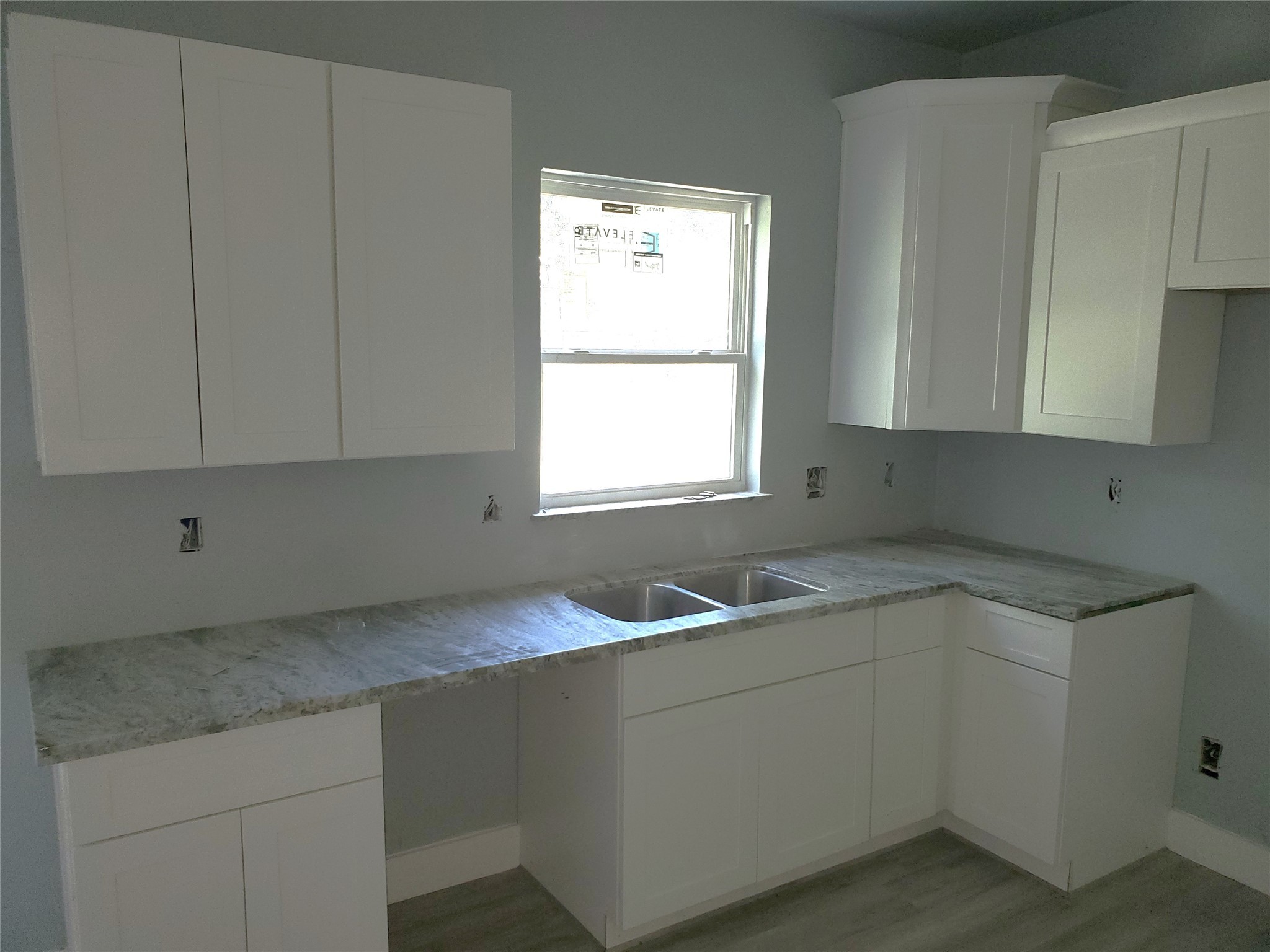 6985 Ellen Lane Beaumont, TX 77708 - Photo 6 of 34 a kitchen with a sink cabinets and window