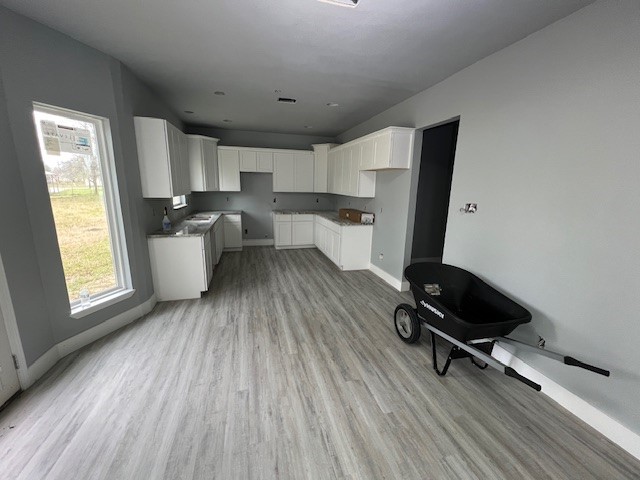 6985 Ellen Lane Beaumont, TX 77708 - Photo 10 of 34 a living room with furniture and a wooden floor