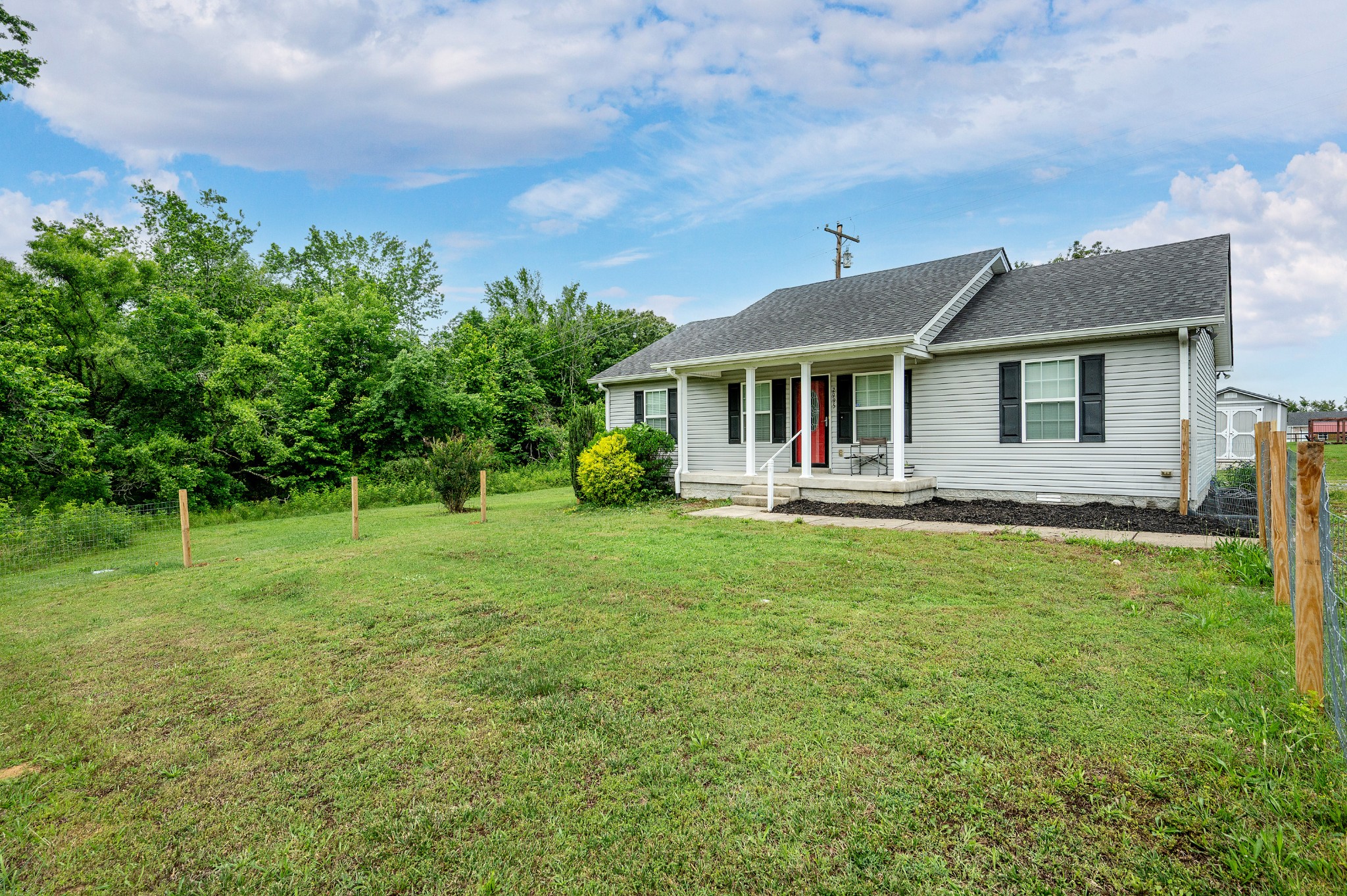 2995 Oak Grove Church Road Bethpage, TN 37022 - Photo 28 of 28 a front view of house with yard and green space
