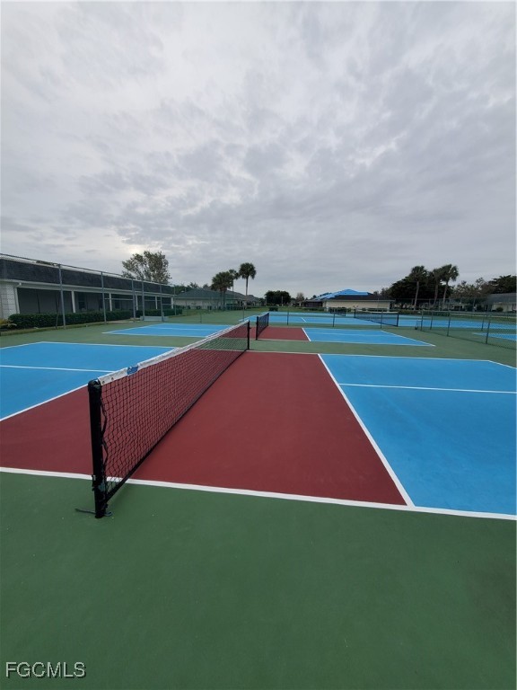 1304 South Brandywine Circle, Unit 3 Fort Myers, FL 33919 - Photo 23 of 29 a view of a tennis court