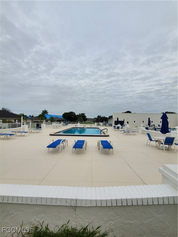 1304 South Brandywine Circle, Unit 3 Fort Myers, FL 33919 - Photo 25 of 29 a view of swimming pool and lake view