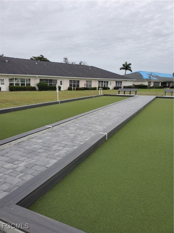 1304 South Brandywine Circle, Unit 3 Fort Myers, FL 33919 - Photo 29 of 29 an aerial view of a house with a yard and lake view