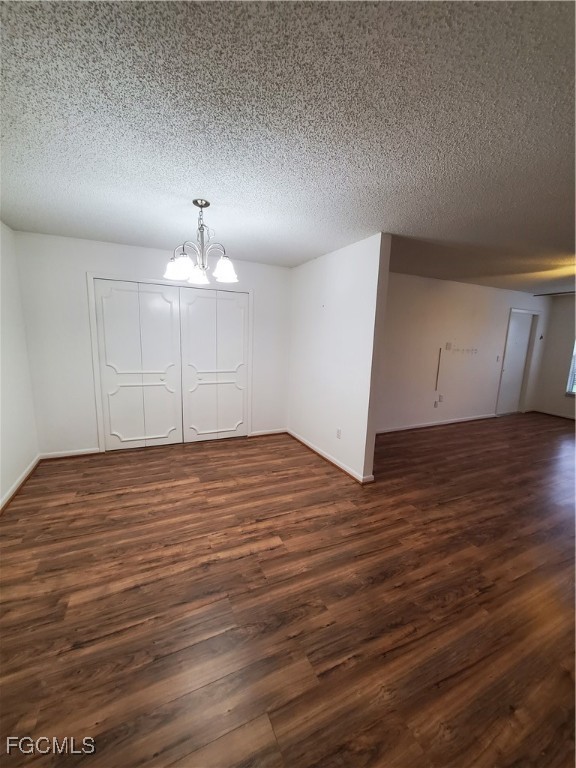 1304 South Brandywine Circle, Unit 3 Fort Myers, FL 33919 - Photo 9 of 29 a view of an empty room with wooden floor