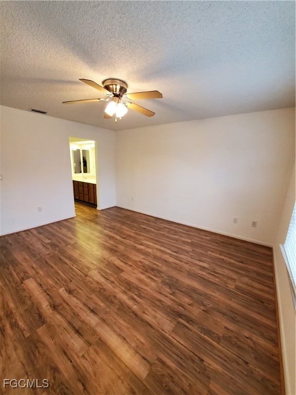 1304 South Brandywine Circle, Unit 3 Fort Myers, FL 33919 - Photo 10 of 29 wooden floor in an empty room
