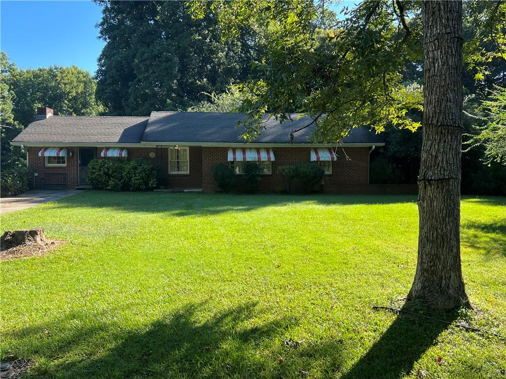 4061 Tilly Mill Road Doraville, GA 30360 - Photo 1 of 1 a view of a swimming pool with a patio