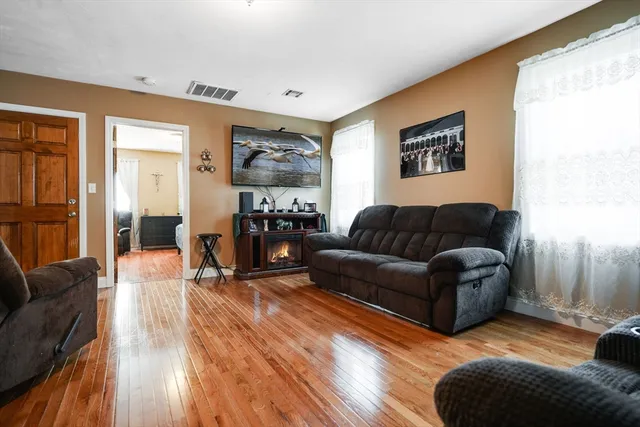 a kitchen with stainless steel appliances a stove a sink dishwasher and a refrigerator