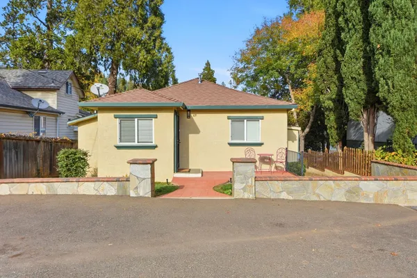 front view of a house with a patio