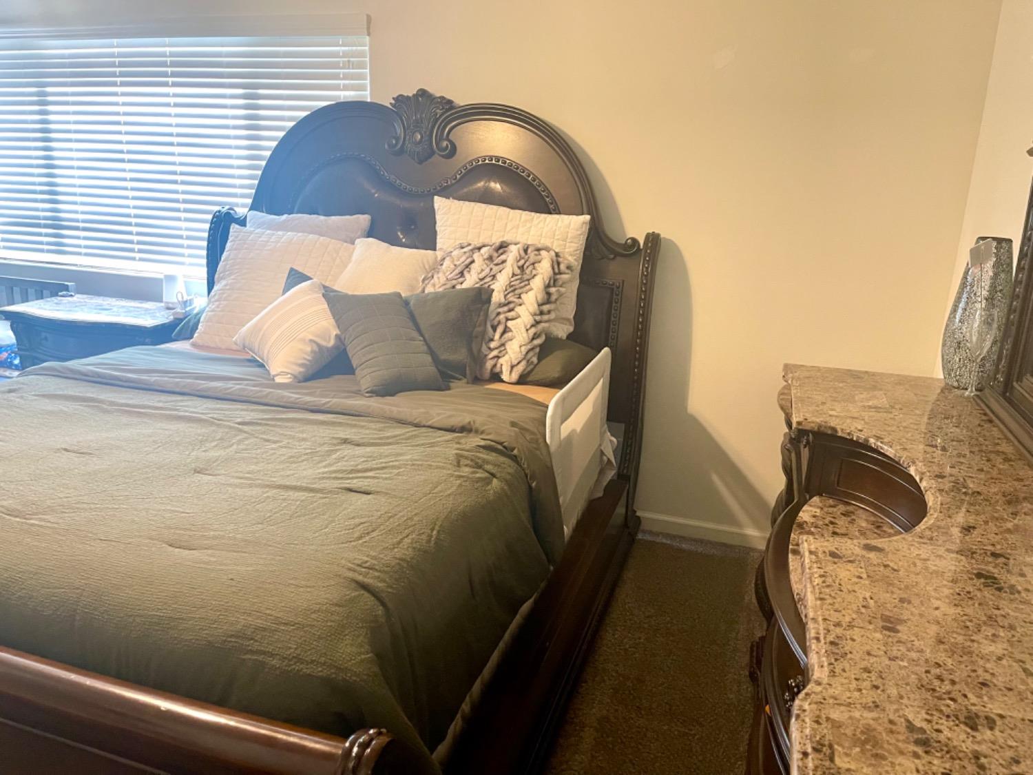 3727 Highclere Way Clovis, CA 93619 - Photo 19 of 25 a bed sitting in a bedroom next to a window