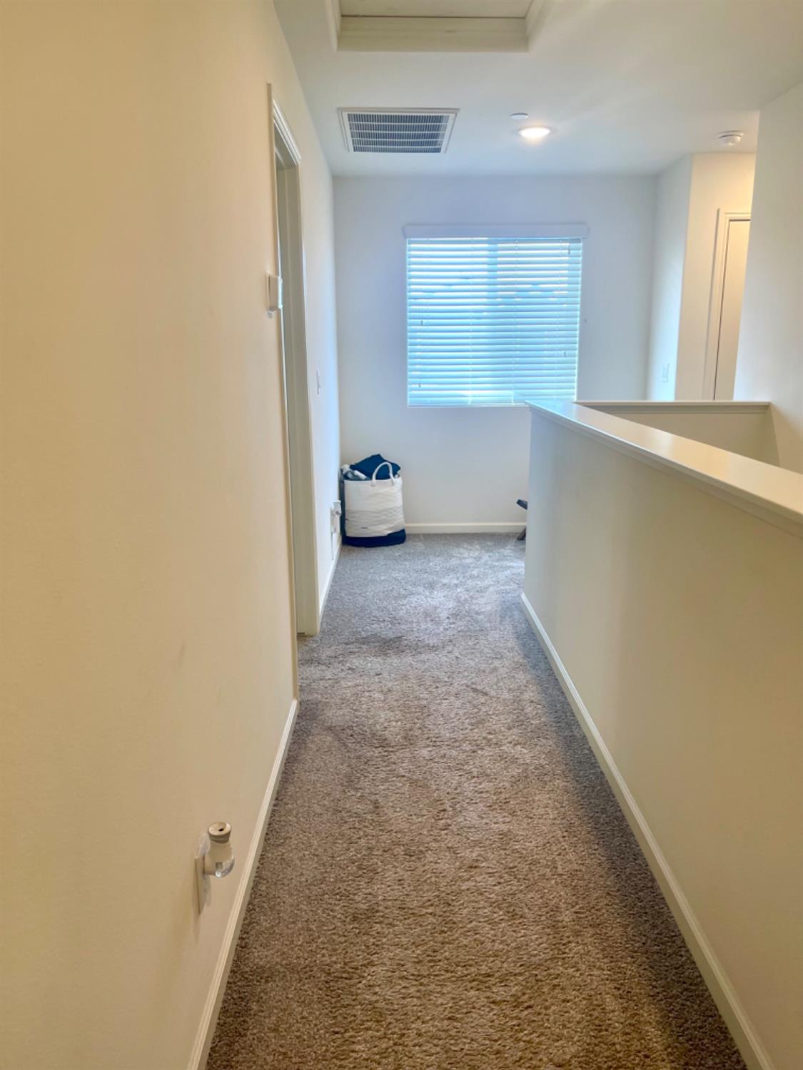 3727 Highclere Way Clovis, CA 93619 - Photo 20 of 25 an empty room with windows