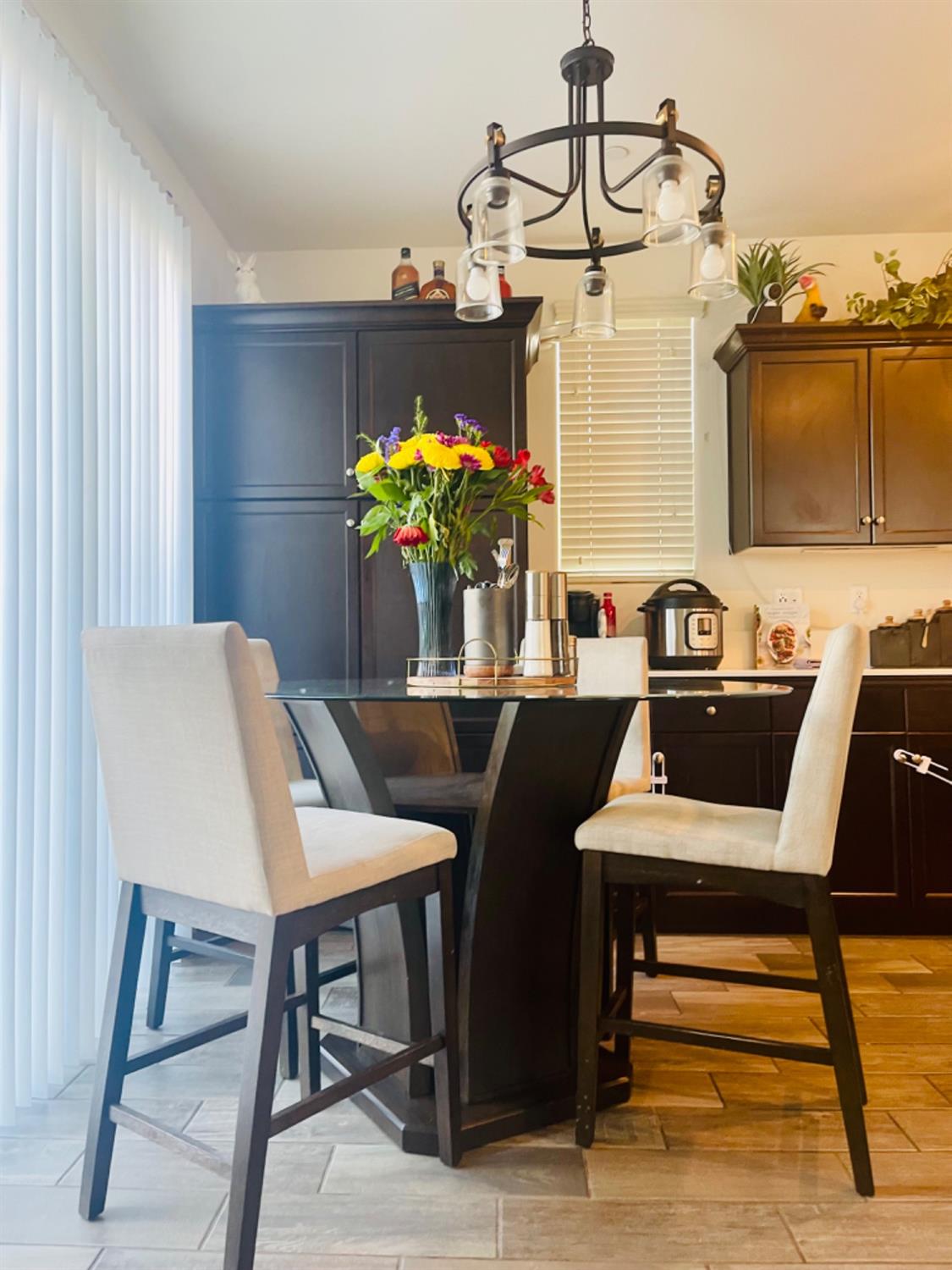 3727 Highclere Way Clovis, CA 93619 - Photo 9 of 25 a dining room with furniture and window