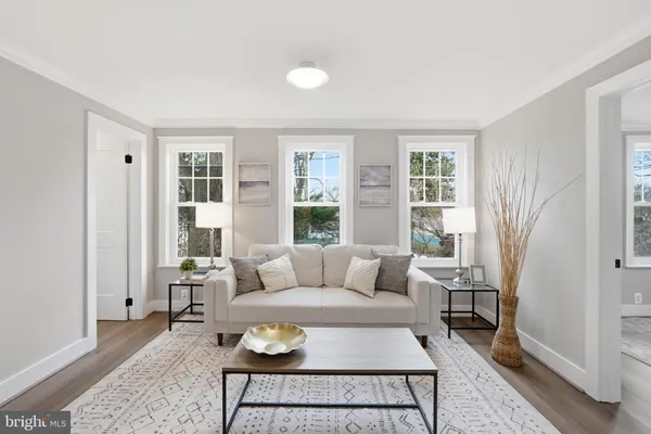 a view of a livingroom with furniture and window