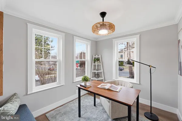 a bathroom with a sink a mirror and a shower