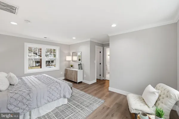 a room with furniture and wooden floor