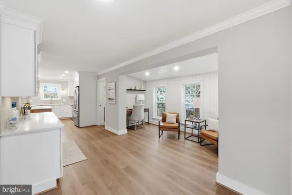 a view of a kitchen and dining room