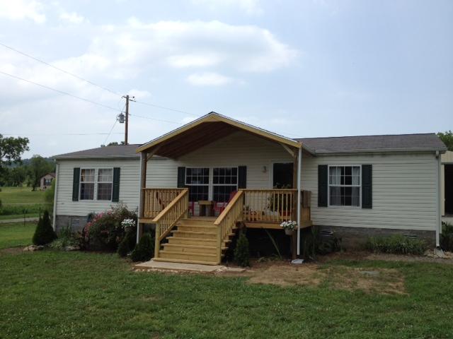 465 Storytown Road Hartsville, TN 37074 - Photo 1 of 16 Newly added porch with valted ceiling