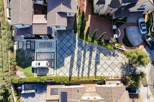 a view of a patio with swimming pool table and chairs