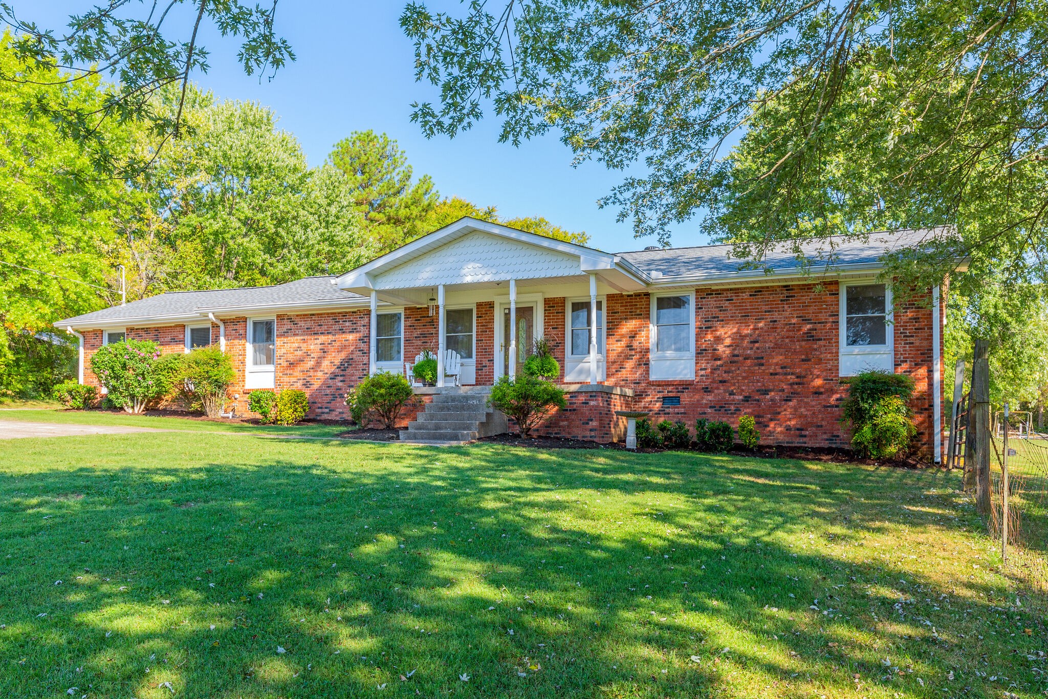 5111 Hickory Ridge Road Lebanon, TN 37090 - Photo 1 of 53 a front view of a house with a yard