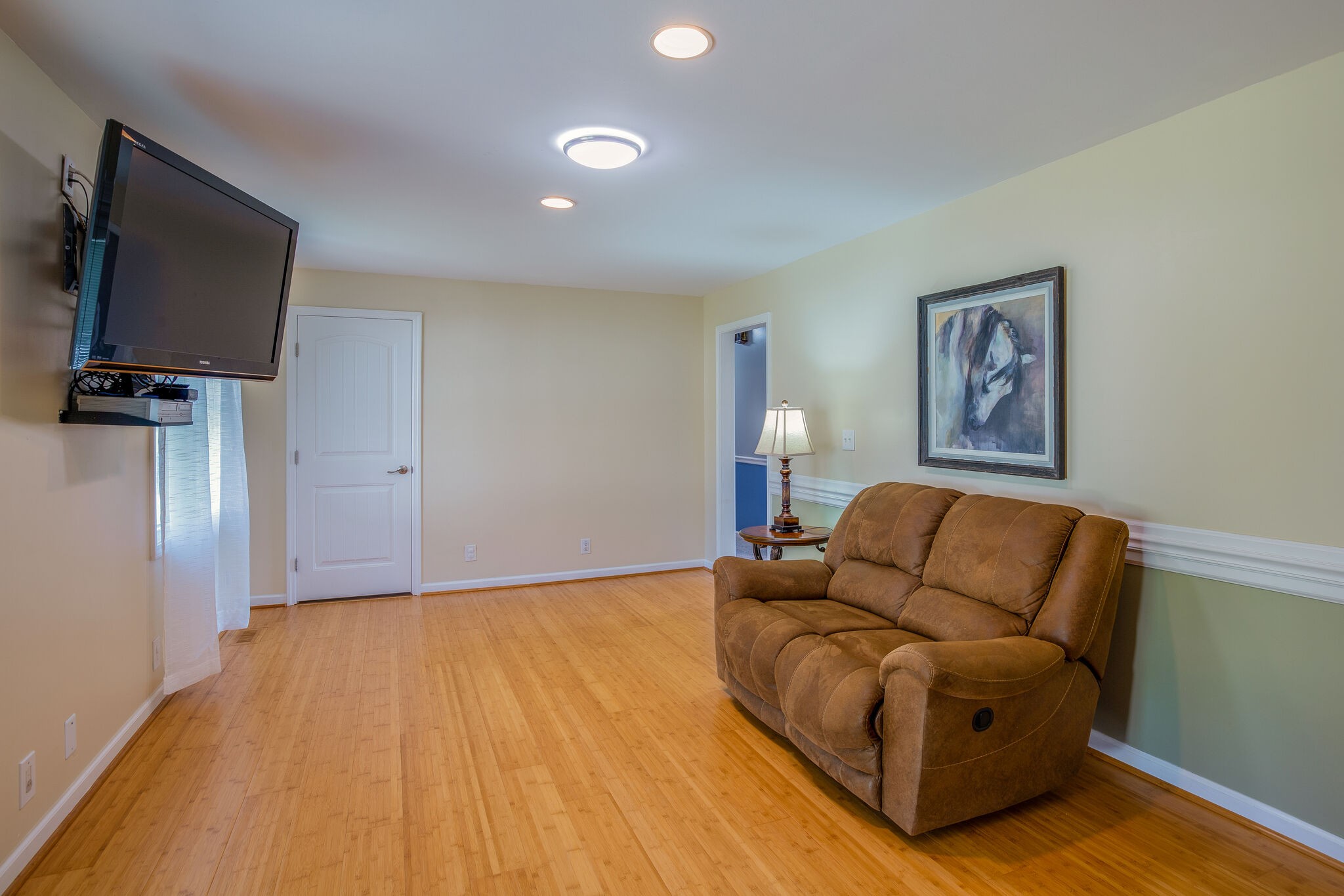 5111 Hickory Ridge Road Lebanon, TN 37090 - Photo 11 of 53 a living room with furniture and a flat screen tv